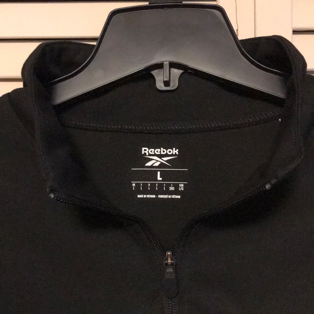 Reebok 1/4 zip pullover, white stripes and logo, full front pouch, elastic wrist